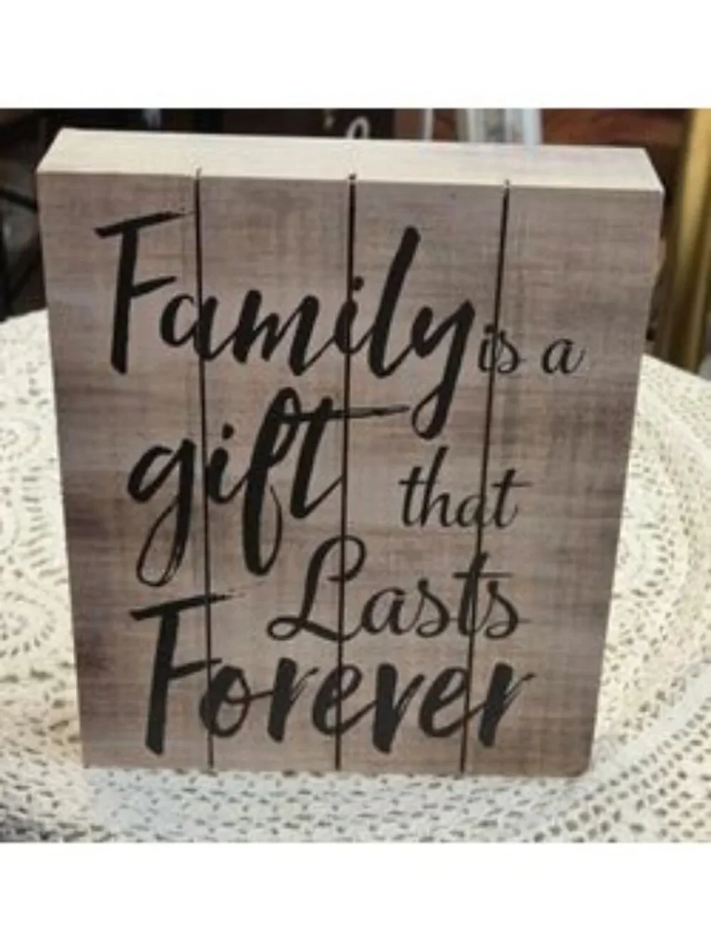 At home plaque with saying